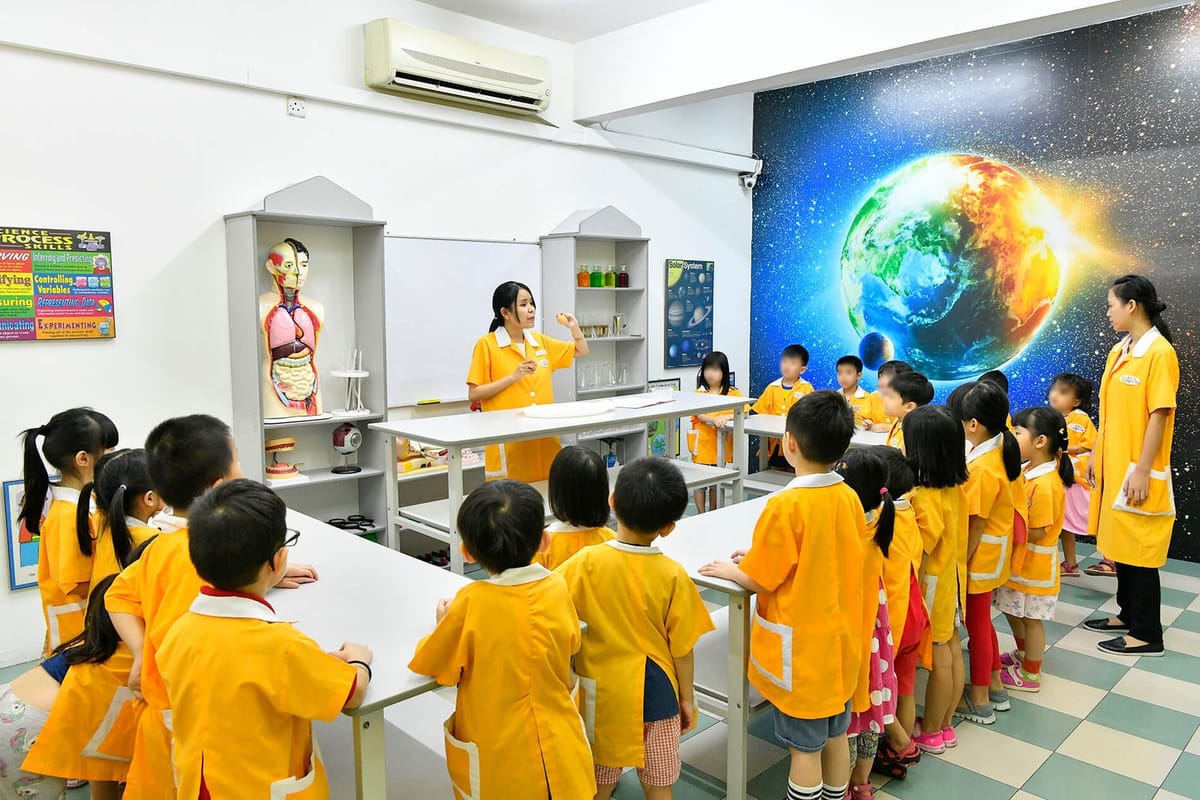 Teachers leading a science lesson in the science centre